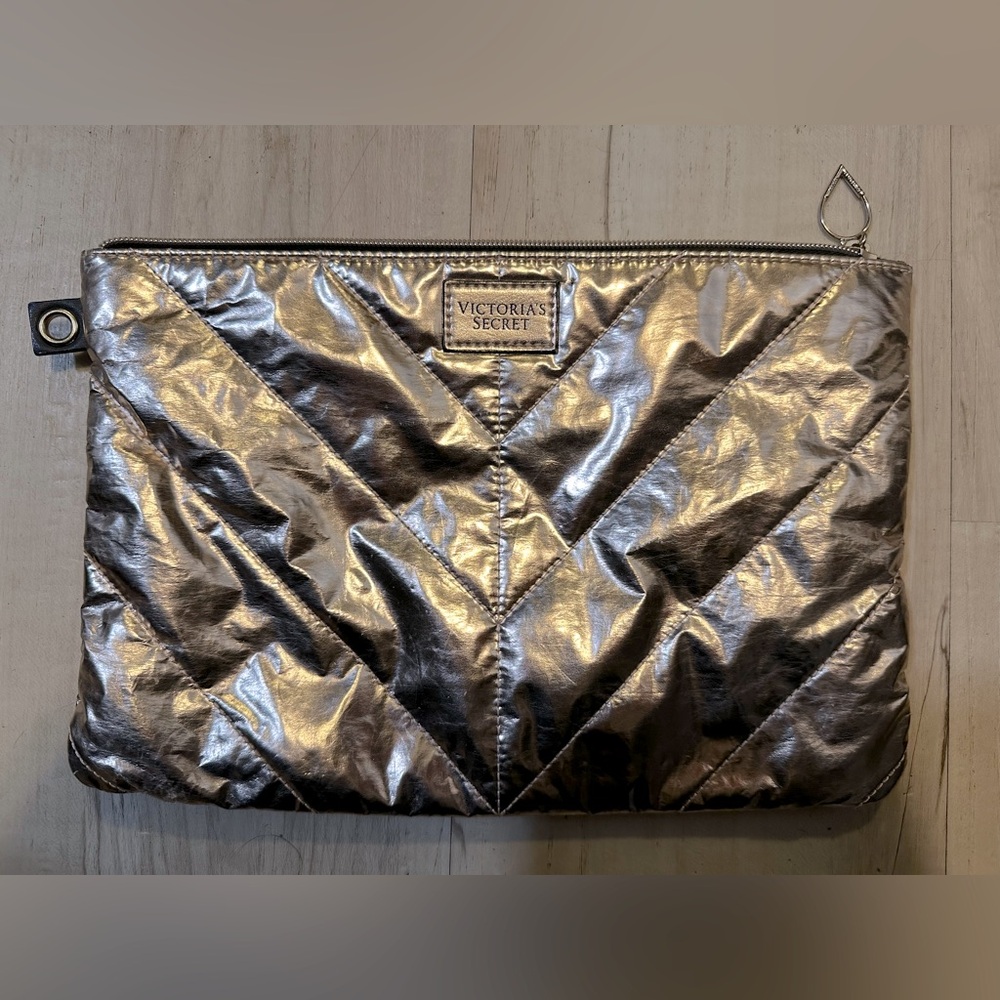 Victoria’s Secret metalic pink, zipper bag, 12” across and 8” tall.